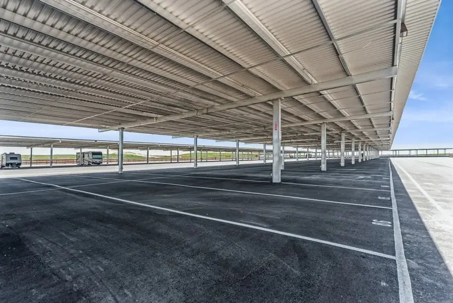 Empty lot of covered parking spaces