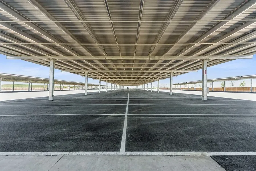 Empty lot of covered parking spaces