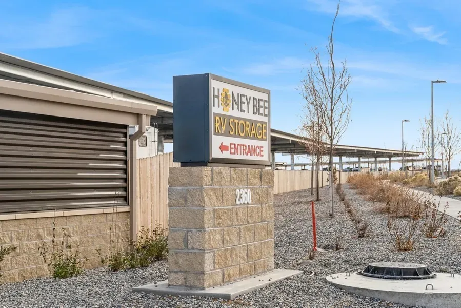 Honey Be RV Storage Entrance sign.