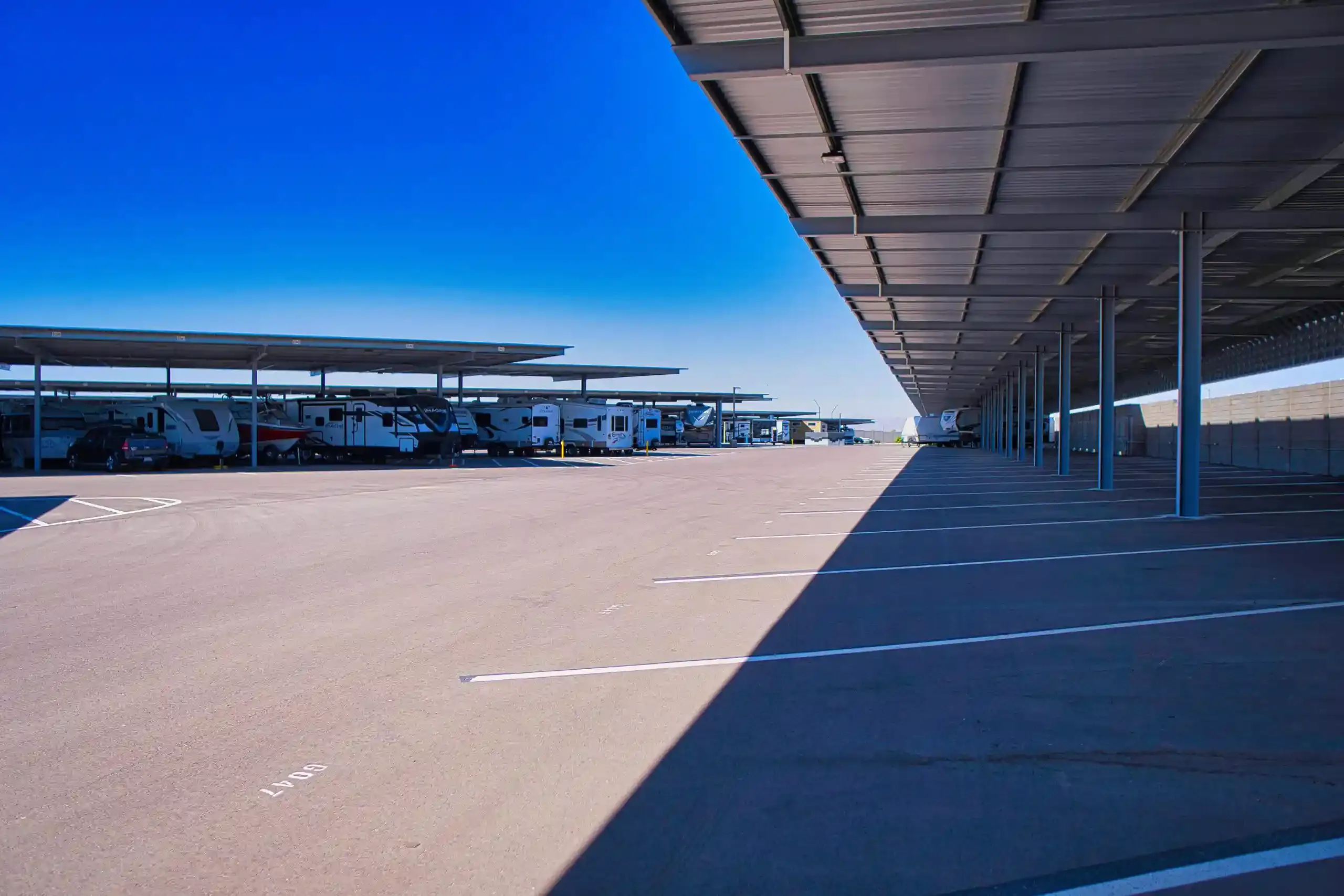 Honey Bee RV in Peoria parking with awning