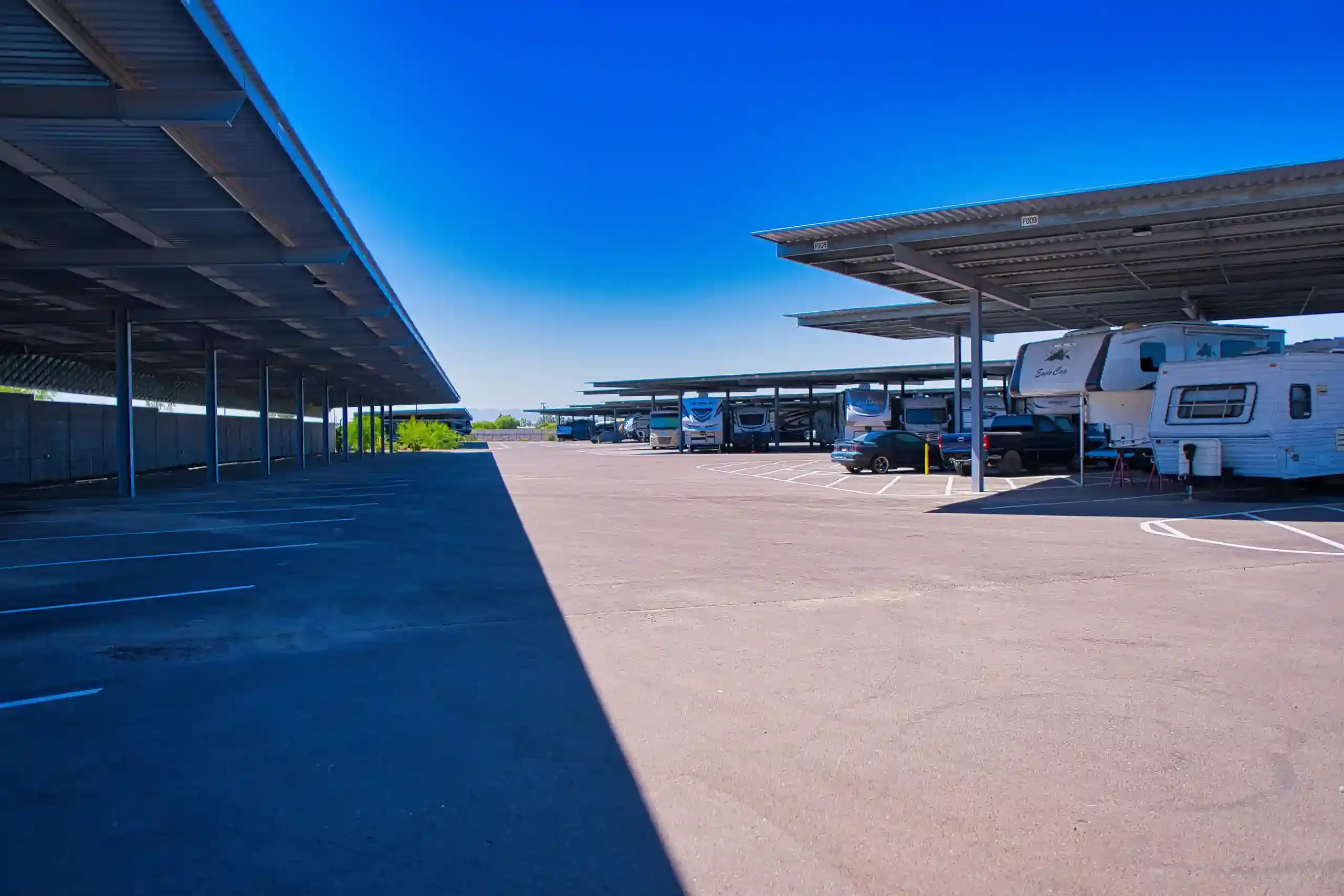 Honey Bee RV in Peoria parking with awning